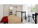 Hallway showing laundry room, bench, and chandelier at 151 Overhill Point, Alpharetta, GA 30005