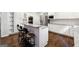 Contemporary kitchen with stainless steel appliances and breakfast bar at 151 Overhill Point, Alpharetta, GA 30005