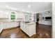 Beautiful, open kitchen with granite countertops, stainless steel appliances and hardwood flooring at 151 Overhill Point, Alpharetta, GA 30005