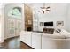 Cozy living room with stone fireplace, high ceilings, and comfortable seating at 151 Overhill Point, Alpharetta, GA 30005