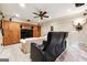 Entertainment area with large storage cabinets, television, and movie seating at 151 Overhill Point, Alpharetta, GA 30005