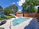 Splash pool featuring a winding water slide and deck chairs to lounge in the sun at 151 Overhill Point, Alpharetta, GA 30005