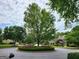 Picturesque neighborhood with a tree-lined cul-de-sac and beautifully landscaped yards at 151 Overhill Point, Alpharetta, GA 30005