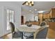 Breakfast area has a table with seating for four and a view of the kitchen and backyard at 164 Interlochen Dr, Peachtree City, GA 30269