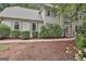 Inviting home exterior with well-manicured landscaping and classic shuttered windows at 164 Interlochen Dr, Peachtree City, GA 30269