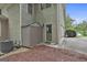 Exterior home view showing a shed, AC unit, and a convenient side entrance at 164 Interlochen Dr, Peachtree City, GA 30269