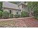 Inviting home exterior with well-manicured landscaping and classic shuttered windows at 164 Interlochen Dr, Peachtree City, GA 30269