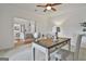 Bright home office with a neutral color scheme and carpet at 164 Interlochen Dr, Peachtree City, GA 30269