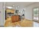 Well-lit kitchen with wood cabinets, granite countertops, and stainless steel appliances at 164 Interlochen Dr, Peachtree City, GA 30269