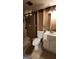 Bathroom features a shower, toilet and vanity with an unfinished wall at 766 Virginia Cir, Forest Park, GA 30297