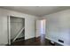 Cozy bedroom with wood floors, ample natural light, and a closet at 766 Virginia Cir, Forest Park, GA 30297