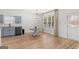 Open kitchen with dining area, stainless steel dishwasher, and view to the outdoors at 23 Skyland W Dr, Locust Grove, GA 30248