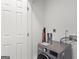 Laundry room featuring a modern washing machine and white walls at 23 Skyland W Dr, Locust Grove, GA 30248