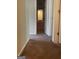 Carpeted hallway with doorways leading to rooms at 8170 Oakley Cir # 2, Union City, GA 30291