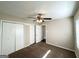 Neutral bedroom features carpet, ceiling fan, and closet at 3115 Pinehill Dr, Decatur, GA 30032