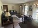 Cozy living room with comfortable seating, natural light, and an inviting atmosphere at 5125 Flakes Mill Rd, Ellenwood, GA 30294
