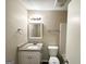 Well-lit bathroom with granite countertop and shower/tub combo at 1362 Mill Lake Cir, Stone Mountain, GA 30088