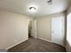 Neutral bedroom with carpeted floor, white trim, window and closet at 1362 Mill Lake Cir, Stone Mountain, GA 30088