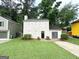 Charming two-story home with well-maintained lawn and inviting curb appeal at 1362 Mill Lake Cir, Stone Mountain, GA 30088