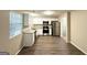 Modern kitchen with stainless steel appliances and ample counter space for cooking at 1362 Mill Lake Cir, Stone Mountain, GA 30088