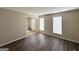 Living area with lots of natural light and neutral walls and flooring at 1362 Mill Lake Cir, Stone Mountain, GA 30088