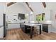 Contemporary kitchen featuring a large island with seating, modern appliances, and ample natural light at 2490 S Carroll St, Villa Rica, GA 30180