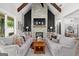Spacious living room with vaulted ceilings, a stone fireplace, and stylish decor for a welcoming atmosphere at 2490 S Carroll St, Villa Rica, GA 30180