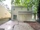 The backyard features a sliding glass door and concrete patio, offering outdoor living space at 2146 Wingfoot Pl, Decatur, GA 30035