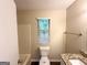 Well-lit bathroom with a granite vanity, a bathtub-shower combination, and neutral finishes at 2146 Wingfoot Pl, Decatur, GA 30035