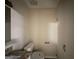 Compact bathroom featuring a granite countertop vanity and a standard toilet at 2146 Wingfoot Pl, Decatur, GA 30035