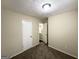 Comfortable bedroom featuring neutral walls, carpet flooring, and ample natural light at 2146 Wingfoot Pl, Decatur, GA 30035