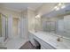 Bathroom featuring a double sink vanity and a separate shower stall at 170 Glen Eagle Way, Mcdonough, GA 30253
