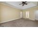 Bedroom with large windows, natural light, and an ensuite bathroom at 170 Glen Eagle Way, Mcdonough, GA 30253
