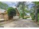 Long driveway leading to a two-car garage and a side entry to home at 170 Glen Eagle Way, Mcdonough, GA 30253