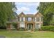 Charming two-story home with green shutters and a well-manicured lawn at 170 Glen Eagle Way, Mcdonough, GA 30253