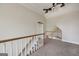 Hallway with carpet flooring and white banister at 170 Glen Eagle Way, Mcdonough, GA 30253