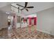 Open-concept living area with unique flooring and high ceilings at 170 Glen Eagle Way, Mcdonough, GA 30253