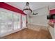 Spacious living room featuring hardwood floors and views to another section at 170 Glen Eagle Way, Mcdonough, GA 30253