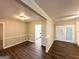 Open floor plan features updated flooring, access to kitchen and outdoor at 1918 Leigh Sw Dr, Conyers, GA 30094