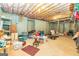 Unfinished basement space with exposed ceiling is ready to be transformed to suit your needs at 235 Ashley Forest Dr, Fayetteville, GA 30214