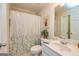 Bathroom featuring a shower with leafy curtain at 235 Ashley Forest Dr, Fayetteville, GA 30214