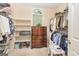 Walk-in closet with shelving and clothes rods, providing ample storage space at 235 Ashley Forest Dr, Fayetteville, GA 30214