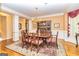 Elegant dining room featuring hardwood floors, and traditional furnishings at 235 Ashley Forest Dr, Fayetteville, GA 30214