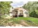 Backyard featuring large home with screened in porch and outdoor deck at 235 Ashley Forest Dr, Fayetteville, GA 30214