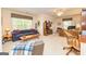 Spacious living room featuring large windows, and a cozy atmosphere at 235 Ashley Forest Dr, Fayetteville, GA 30214