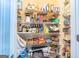 Well-organized walk-in pantry with ample shelving for storage at 235 Ashley Forest Dr, Fayetteville, GA 30214