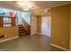 Finished basement includes stairs and doorway for easy access and light green flooring at 6214 Crestview Se Dr, Covington, GA 30014