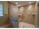 Shower featuring tile backsplash, a built in bench, and safety grab bars at 6214 Crestview Se Dr, Covington, GA 30014