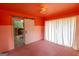 Bright bedroom with closet sliding door, adjoining the kitchen at 6214 Crestview Se Dr, Covington, GA 30014