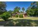Charming home featuring lush greenery and a manicured lawn, adding to its inviting exterior at 6214 Crestview Se Dr, Covington, GA 30014